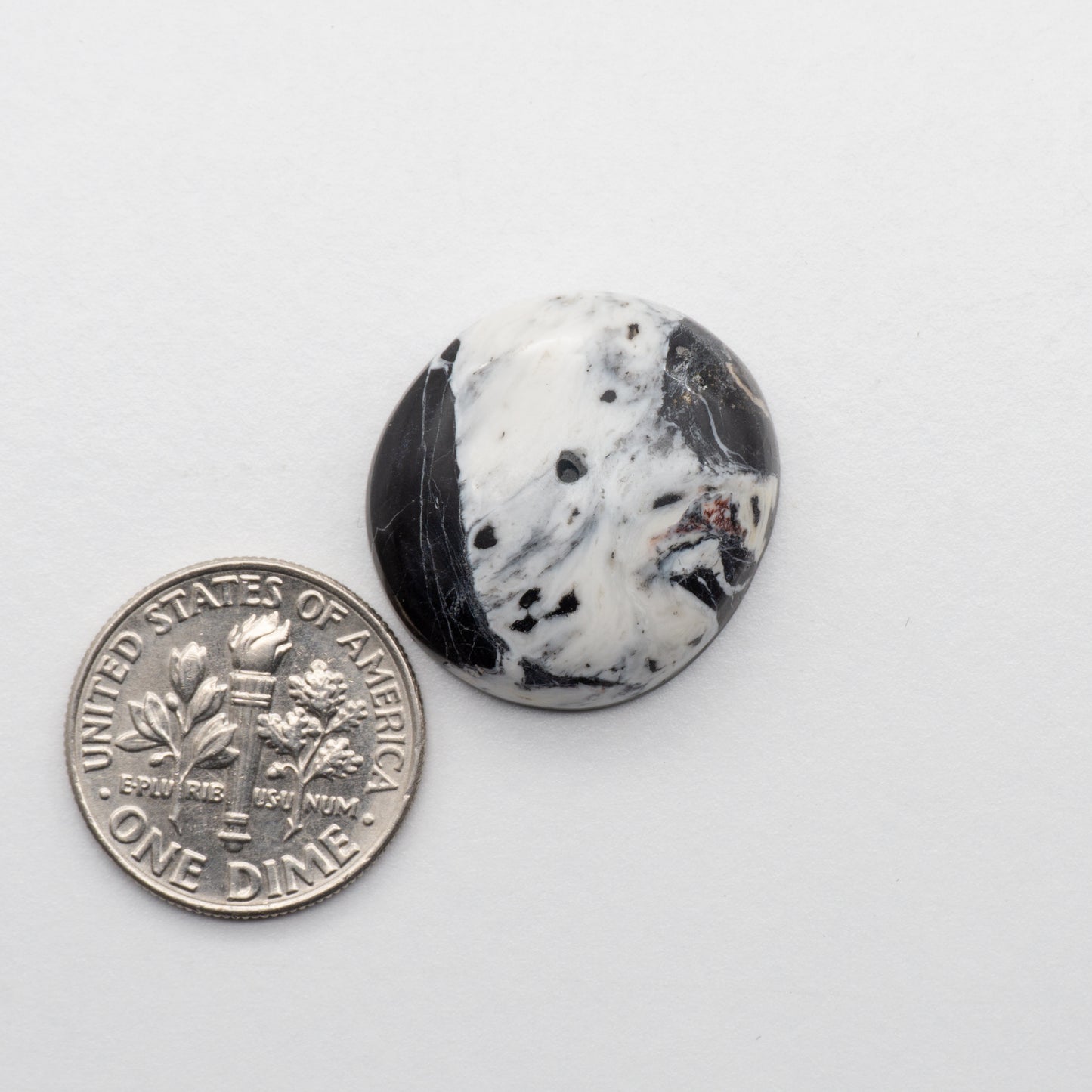 White Buffalo Stone Cabochons are semi-precious gemstones cut into shapes ideal for jewelry-making and crafting. The unique and varied veining of each cabochon lend an unparalleled depth and detail to any project, making them an excellent choice for artisans looking to add an individualistic touch.