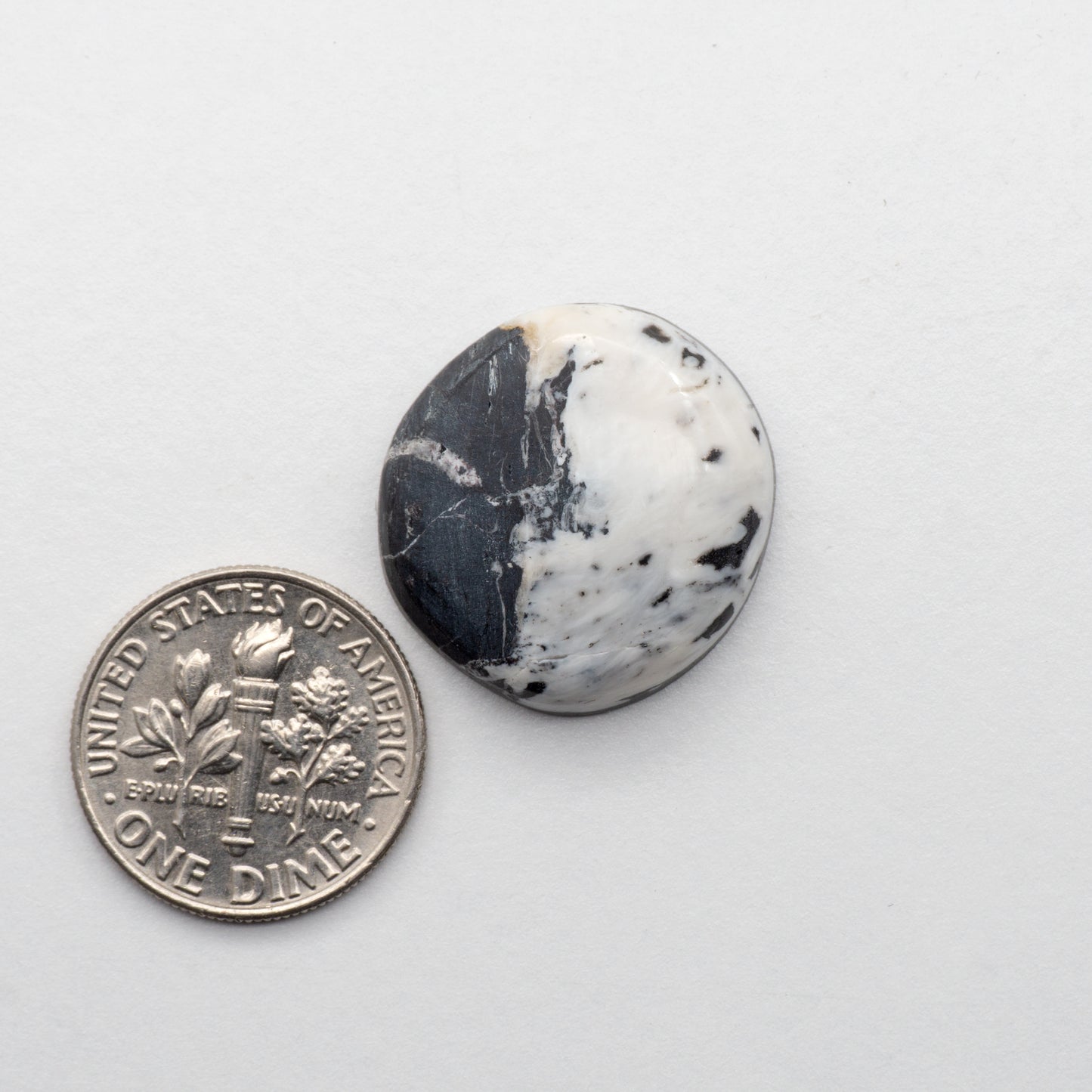 White Buffalo Stone Cabochons are semi-precious gemstones cut into shapes ideal for jewelry-making and crafting. The unique and varied veining of each cabochon lend an unparalleled depth and detail to any project, making them an excellent choice for artisans looking to add an individualistic touch.