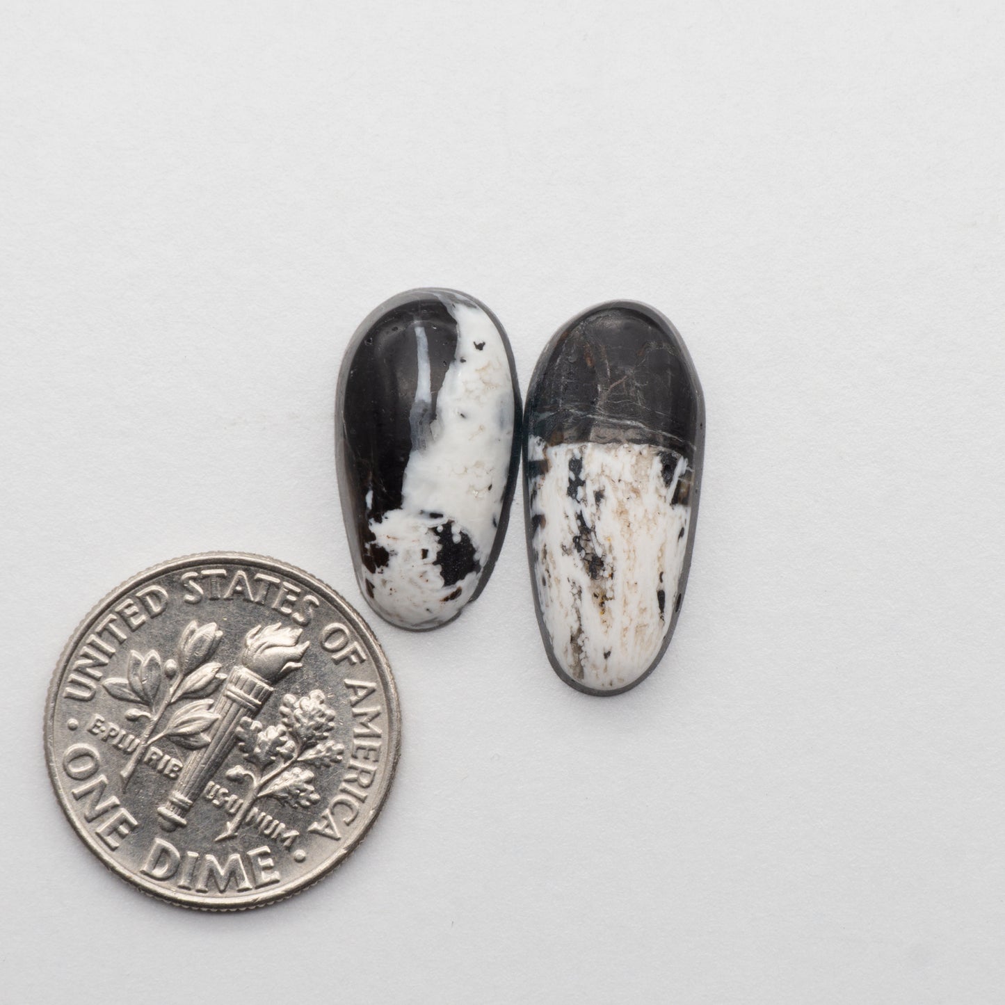 White Buffalo Stone Cabochons are semi-precious gemstones cut into shapes ideal for jewelry-making and crafting. The unique and varied veining of each cabochon lend an unparalleled depth and detail to any project, making them an excellent choice for artisans looking to add an individualistic touch.