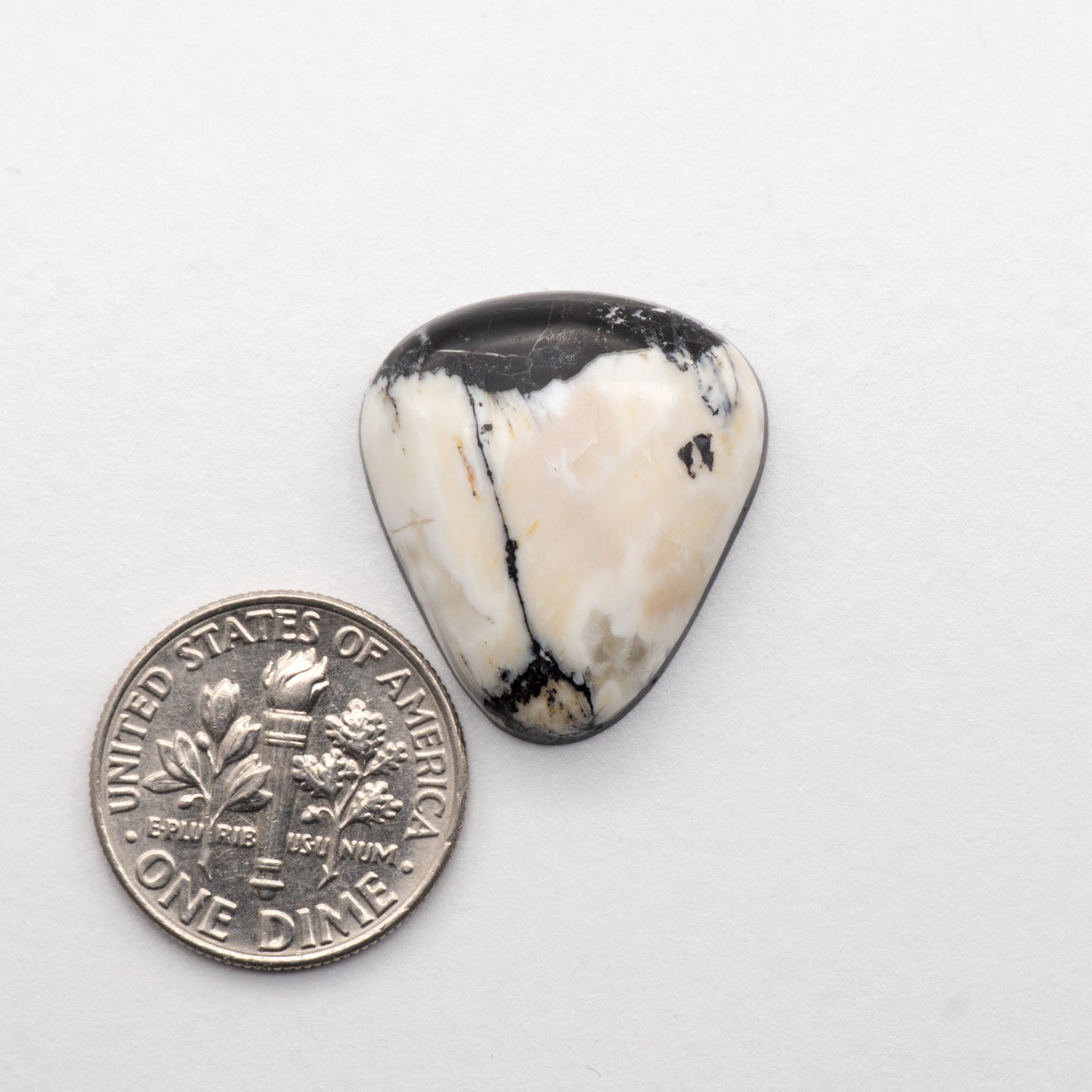 White Buffalo Stone Cabochons are semi-precious gemstones cut into shapes ideal for jewelry-making and crafting. The unique and varied veining of each cabochon lend an unparalleled depth and detail to any project, making them an excellent choice for artisans looking to add an individualistic touch.