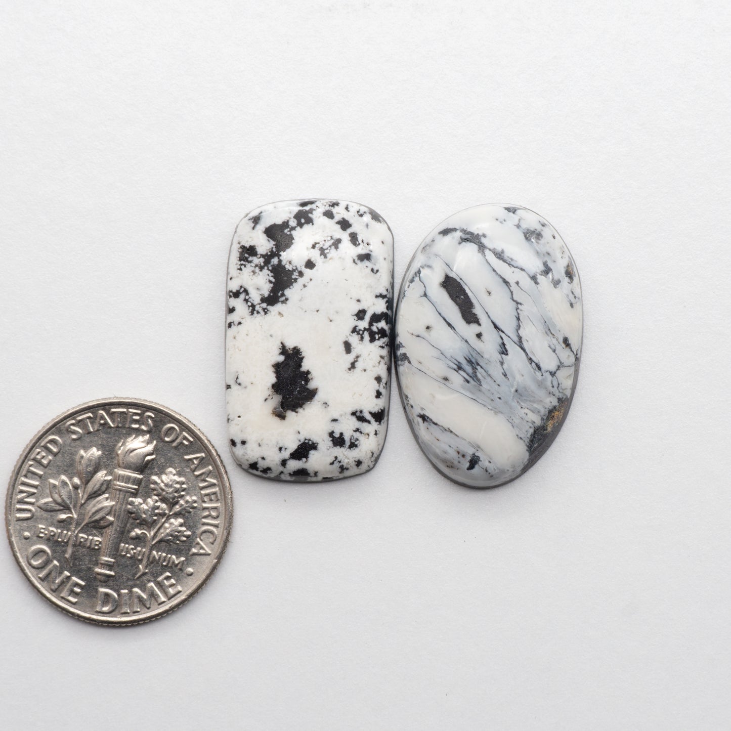 White Buffalo Stone Cabochons are semi-precious gemstones cut into shapes ideal for jewelry-making and crafting. The unique and varied veining of each cabochon lend an unparalleled depth and detail to any project, making them an excellent choice for artisans looking to add an individualistic touch.