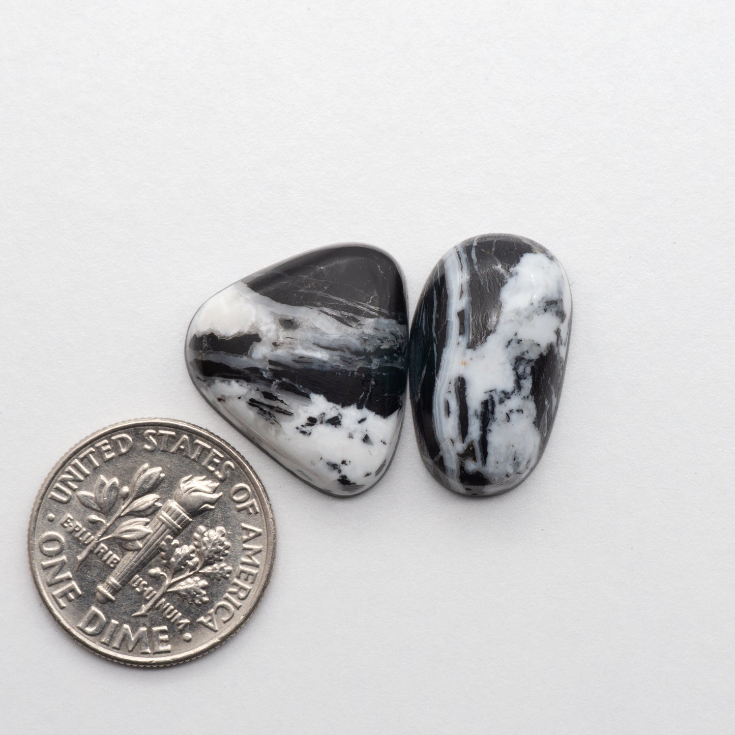 White Buffalo Stone Cabochons are semi-precious gemstones cut into shapes ideal for jewelry-making and crafting. The unique and varied veining of each cabochon lend an unparalleled depth and detail to any project, making them an excellent choice for artisans looking to add an individualistic touch.