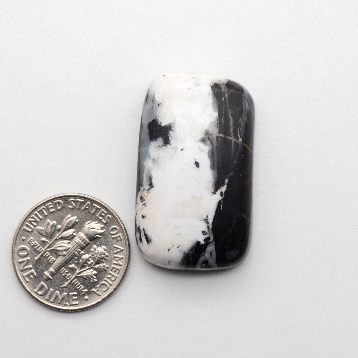 White Buffalo Stone Cabochons are semi-precious gemstones cut into shapes ideal for jewelry-making and crafting. The unique and varied veining of each cabochon lend an unparalleled depth and detail to any project, making them an excellent choice for artisans looking to add an individualistic touch.
