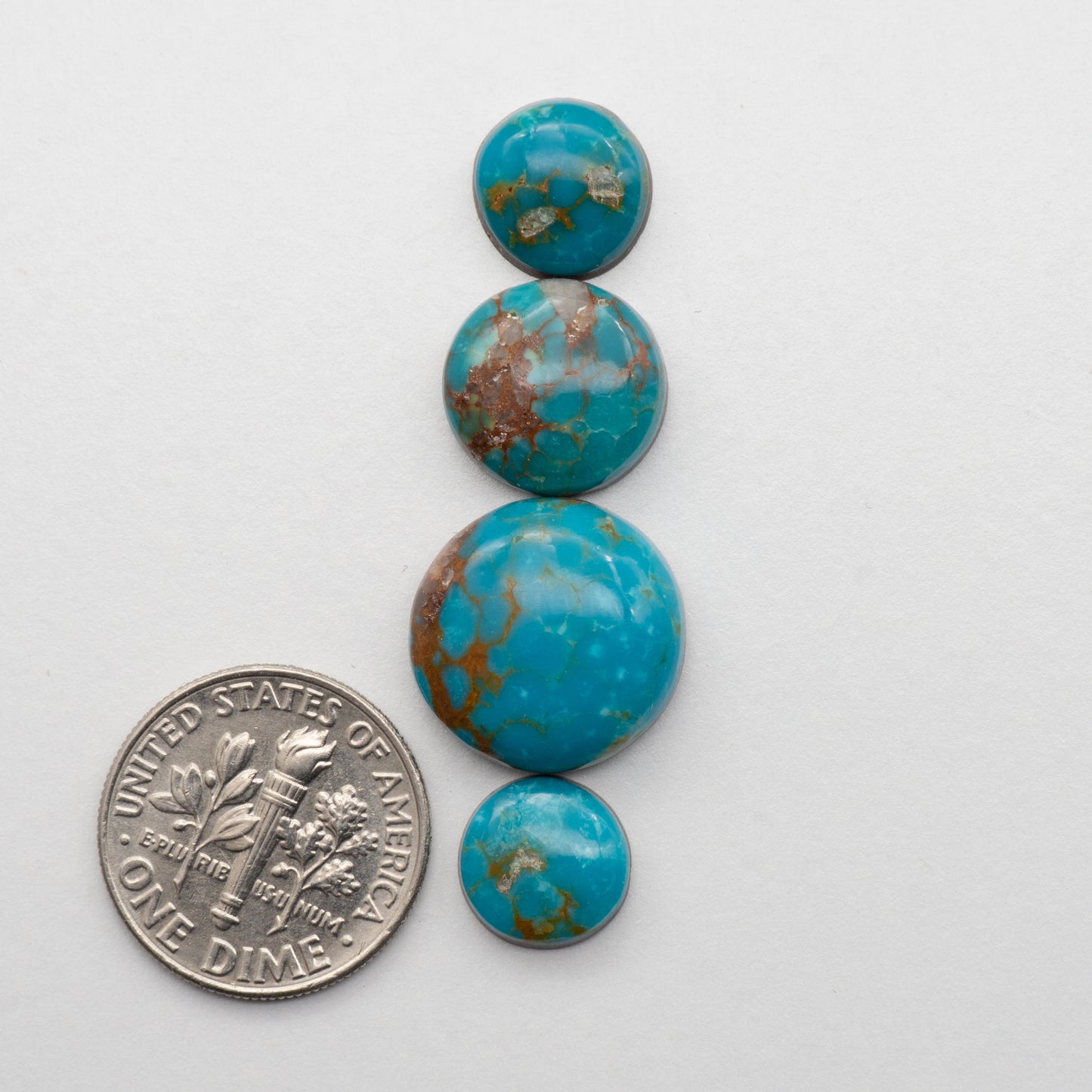 The Cumpas Turquoise is a captivating gemstone with a unique, blue-green color. Derived from a mixture of quartz and algae, this stone is perfect for use in jewelry or other decorative pieces. The natural beauty of the Cumpas Turquoise makes it a stunning addition to any collection.