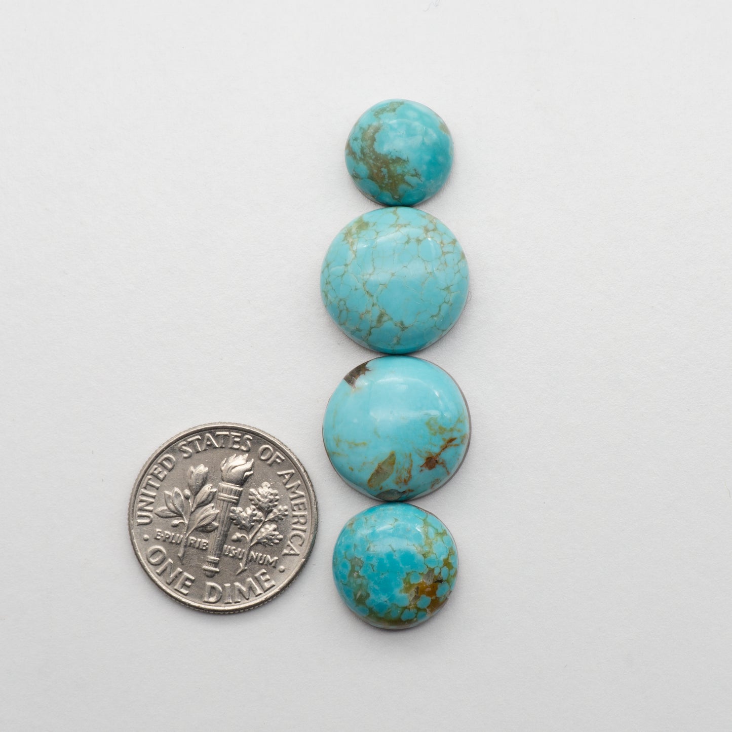 The Cumpas Turquoise is a captivating gemstone with a unique, blue-green color. Derived from a mixture of quartz and algae, this stone is perfect for use in jewelry or other decorative pieces. The natural beauty of the Cumpas Turquoise makes it a stunning addition to any collection.