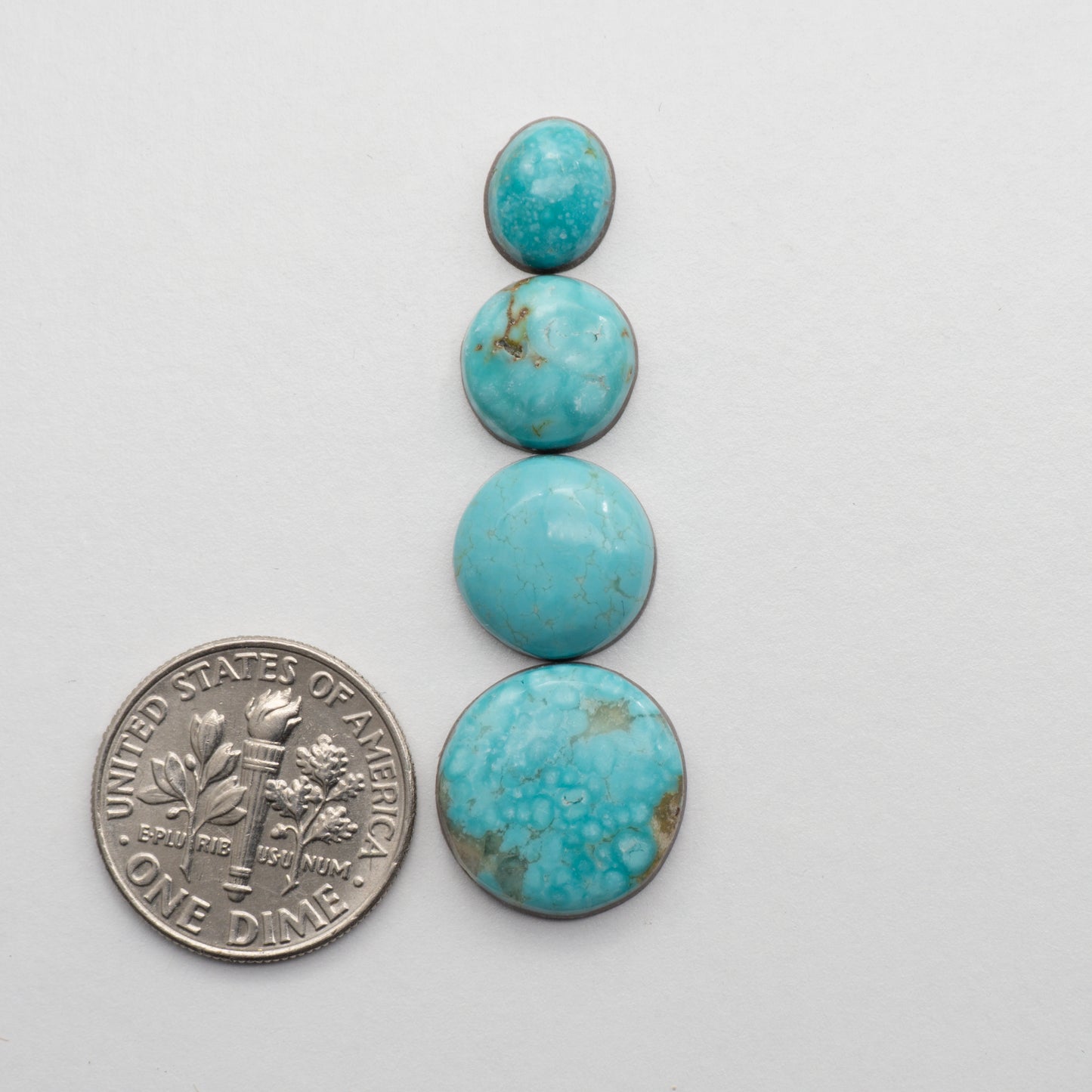 The Cumpas Turquoise is a captivating gemstone with a unique, blue-green color. Derived from a mixture of quartz and algae, this stone is perfect for use in jewelry or other decorative pieces. The natural beauty of the Cumpas Turquoise makes it a stunning addition to any collection.