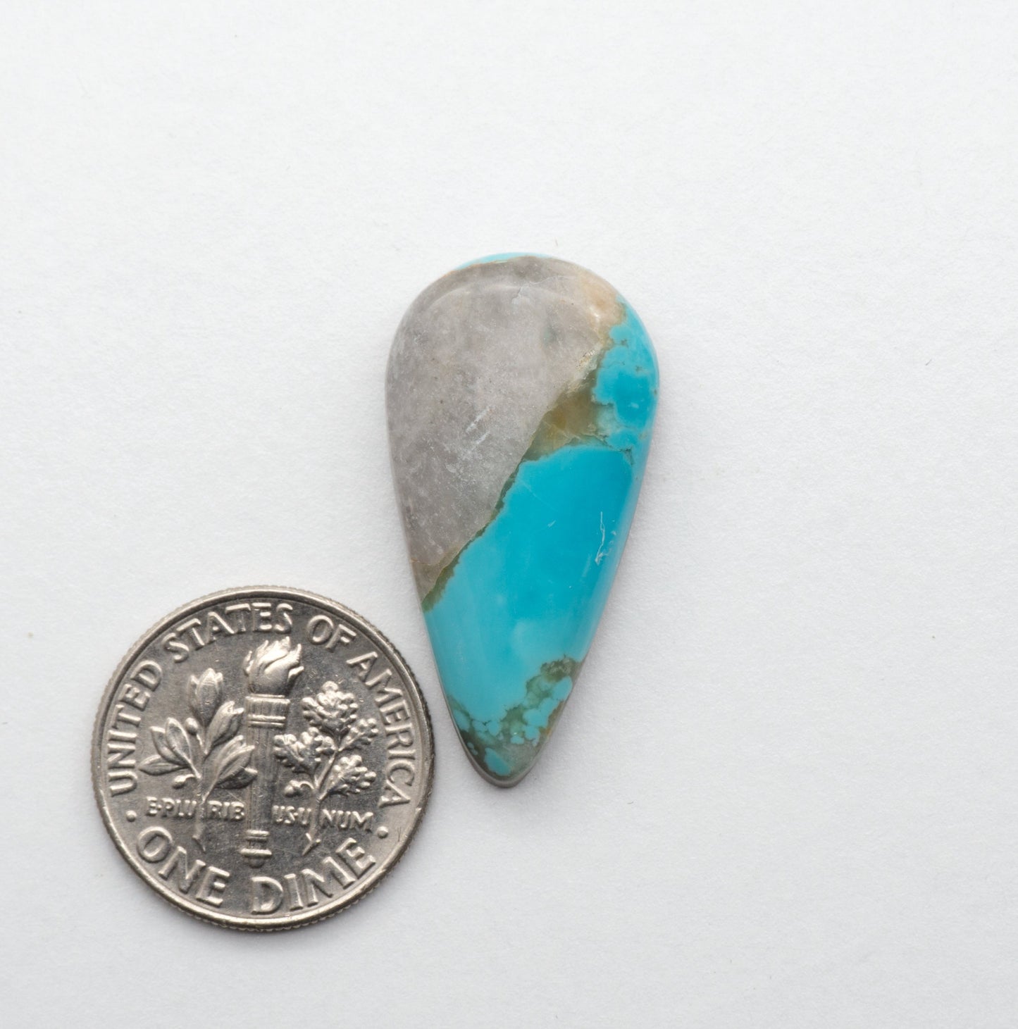 The Cumpas Turquoise is a captivating gemstone with a unique, blue-green color. Derived from a mixture of quartz and algae, this stone is perfect for use in jewelry or other decorative pieces. The natural beauty of the Cumpas Turquoise makes it a stunning addition to any collection.