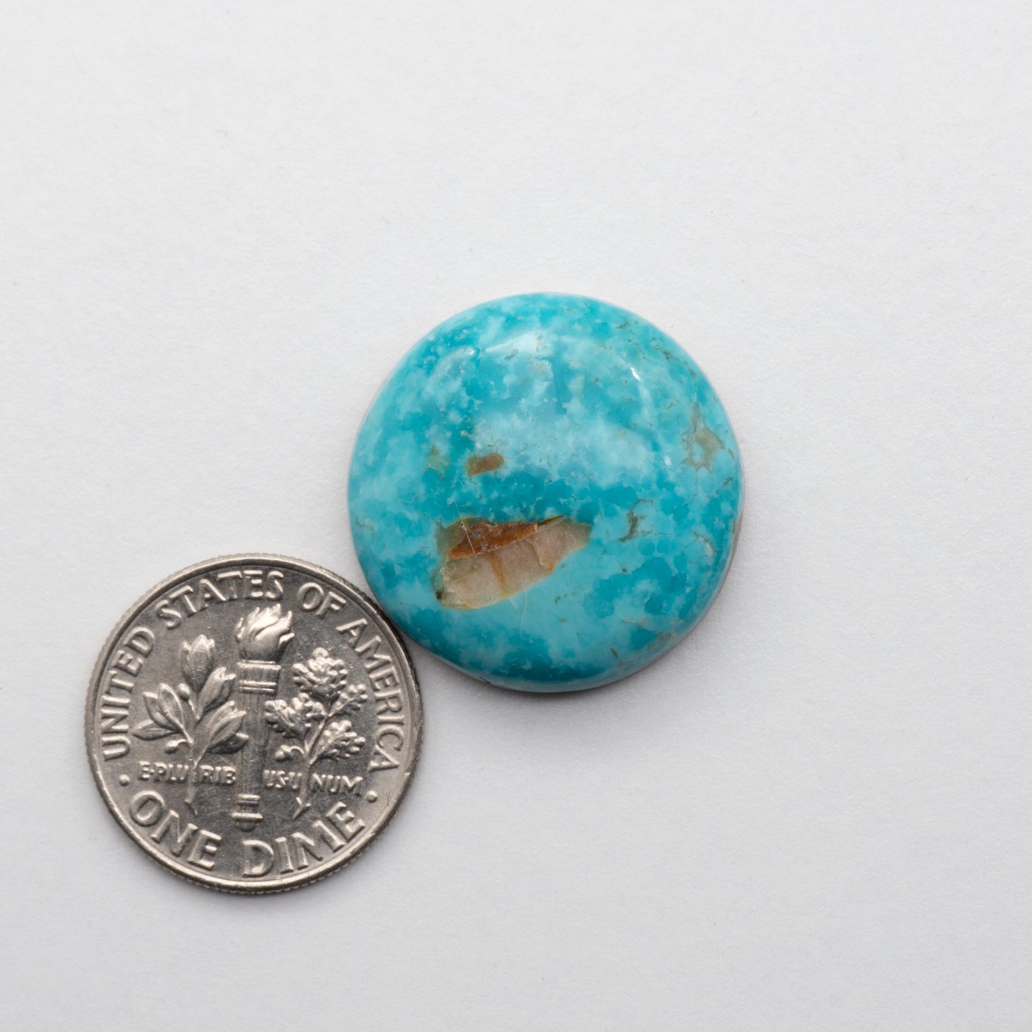 The Cumpas Turquoise is a captivating gemstone with a unique, blue-green color. Derived from a mixture of quartz and algae, this stone is perfect for use in jewelry or other decorative pieces. The natural beauty of the Cumpas Turquoise makes it a stunning addition to any collection.