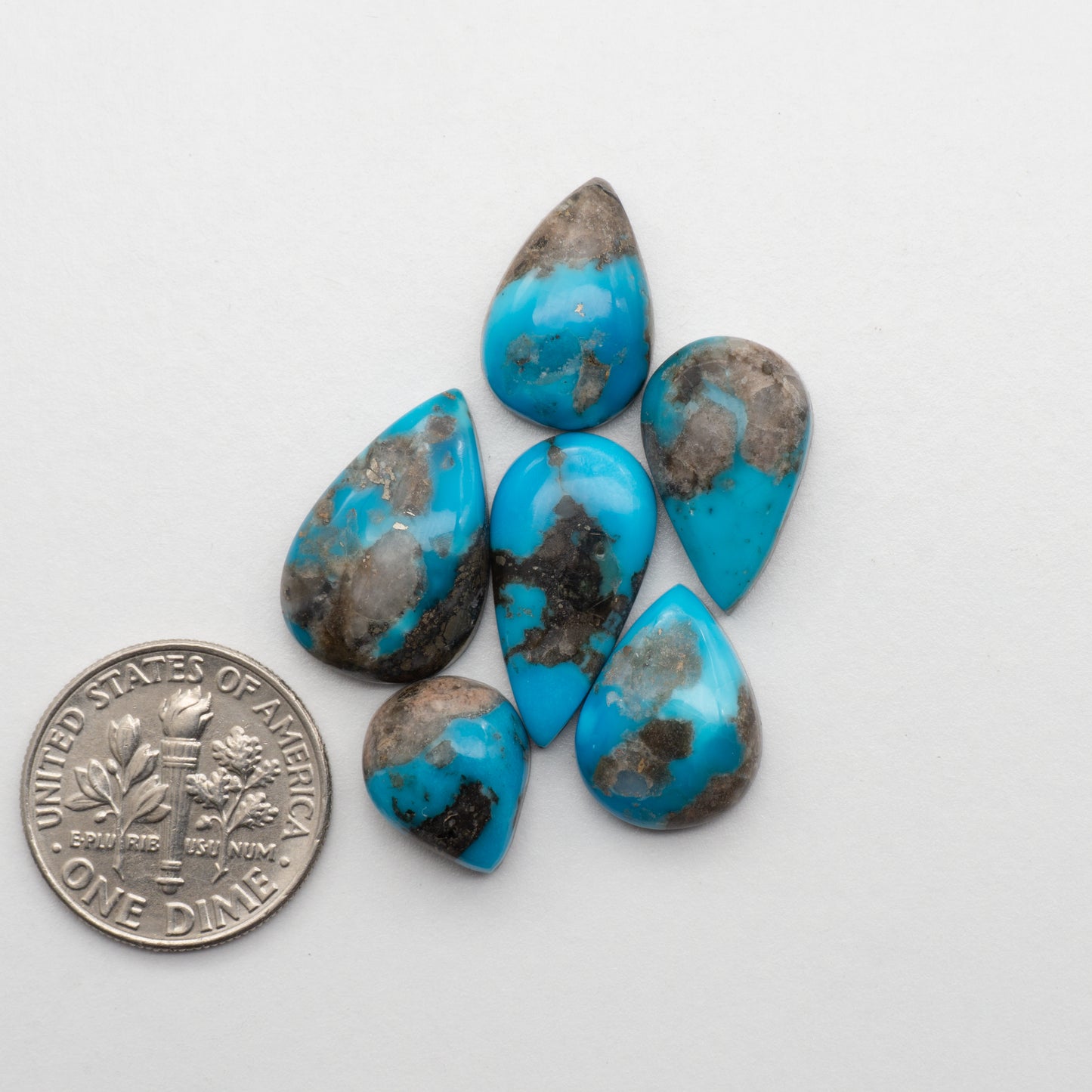 Add unique splashes of color to your jewelry with our Kingman Turquoise Cabochons. Featuring natural blue hues, these cabochons offer a beautiful contrast to any design. Perfect for necklaces, earrings, and more!