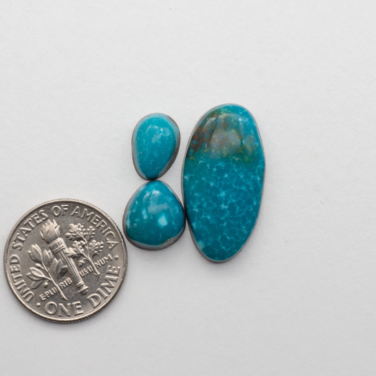 The Cumpas Turquoise is a captivating gemstone with a unique, blue-green color. Derived from a mixture of quartz and algae, this stone is perfect for use in jewelry or other decorative pieces. The natural beauty of the Cumpas Turquoise makes it a stunning addition to any collection.
