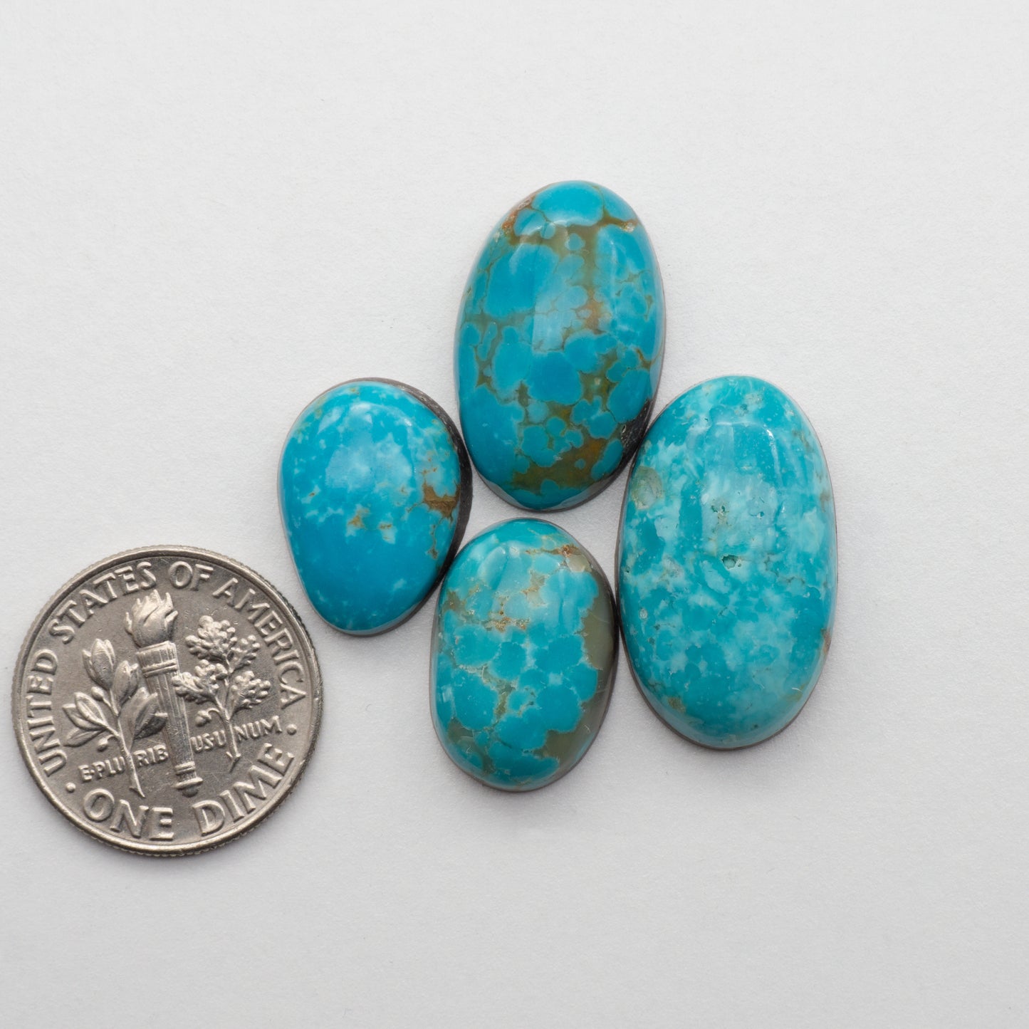 The Cumpas Turquoise is a captivating gemstone with a unique, blue-green color. Derived from a mixture of quartz and algae, this stone is perfect for use in jewelry or other decorative pieces. The natural beauty of the Cumpas Turquoise makes it a stunning addition to any collection.