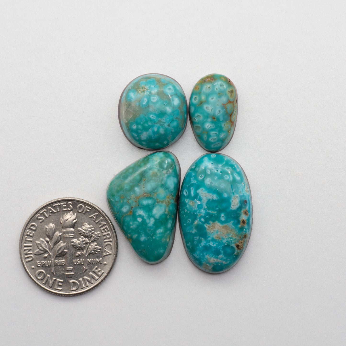 The Cumpas Turquoise is a captivating gemstone with a unique, blue-green color. Derived from a mixture of quartz and algae, this stone is perfect for use in jewelry or other decorative pieces. The natural beauty of the Cumpas Turquoise makes it a stunning addition to any collection.