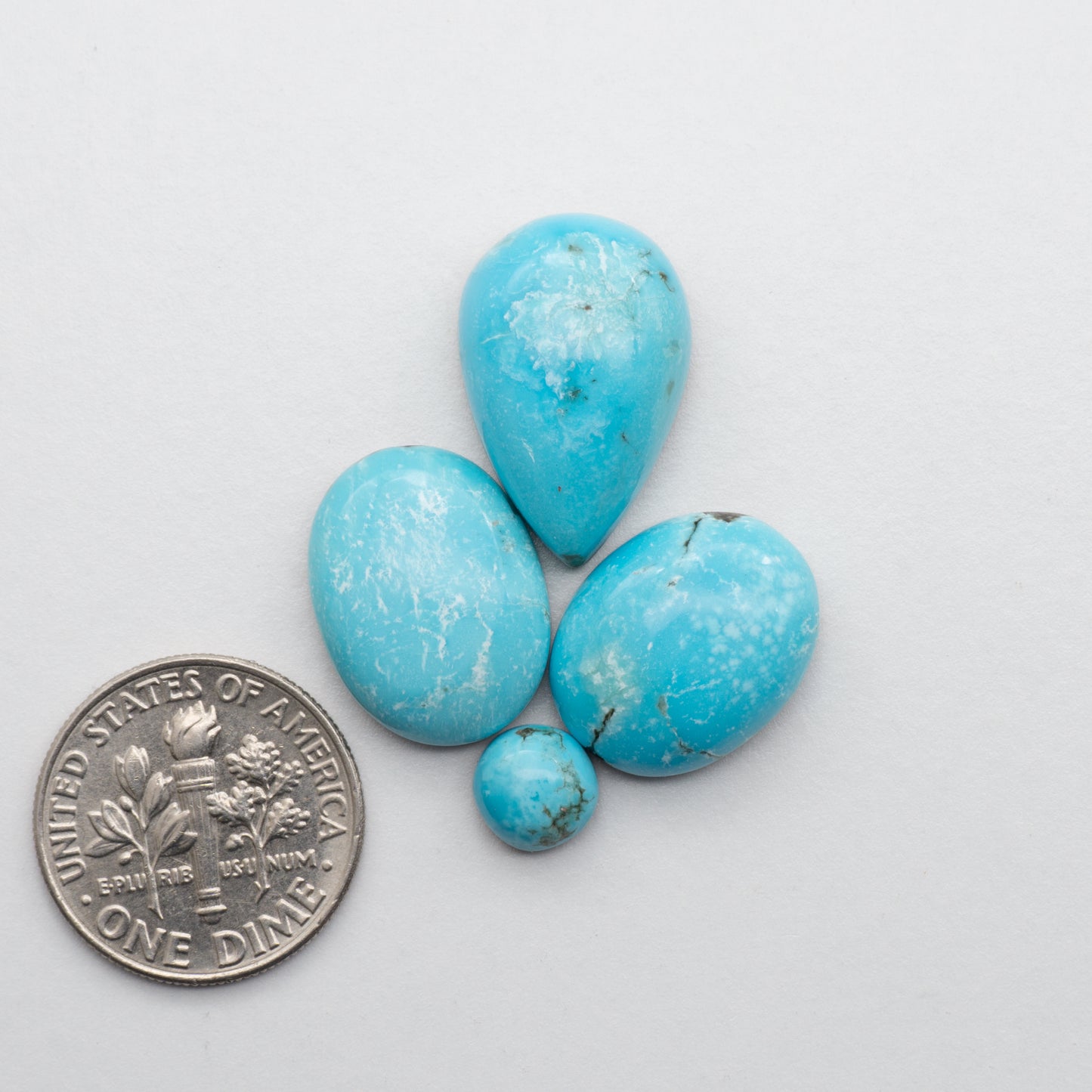 Add unique splashes of color to your jewelry with our Kingman Turquoise Cabochons. Featuring natural blue hues, these cabochons offer a beautiful contrast to any design. Perfect for necklaces, earrings, and more!