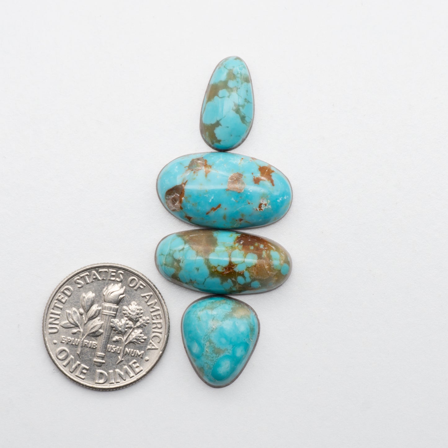These Cumpas Turquoise cabochons have a glossy finish and are backed for added strength. Mined in Sonora, MX. Similar to Kingman Turquoise used for jewerly making.