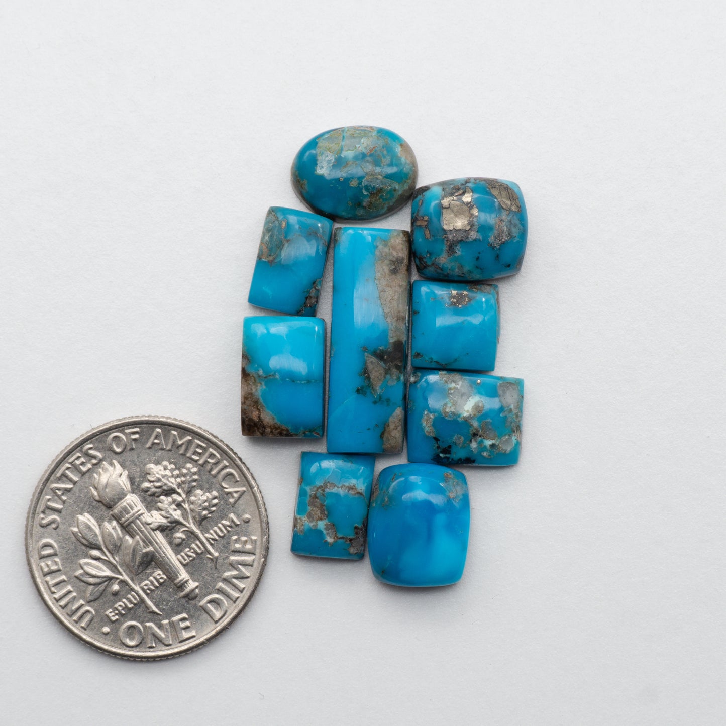 Add unique splashes of color to your jewelry with our Kingman Turquoise Cabochons. Featuring natural blue hues, these cabochons offer a beautiful contrast to any design. Perfect for necklaces, earrings, and more!