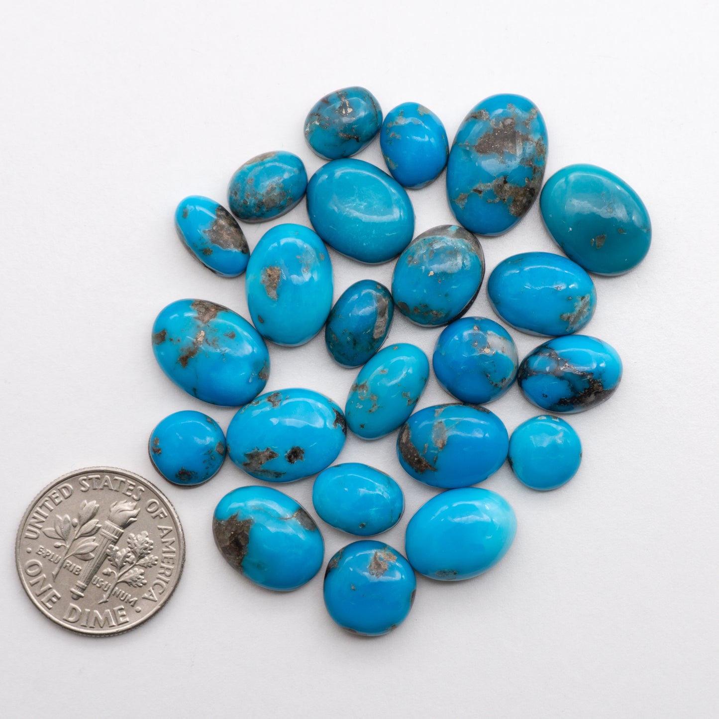 Add unique splashes of color to your jewelry with our Kingman Turquoise Cabochons. Featuring natural blue hues, these cabochons are backed for added strength and offer a beautiful contrast to any design. Perfect for necklaces, earrings, and more!