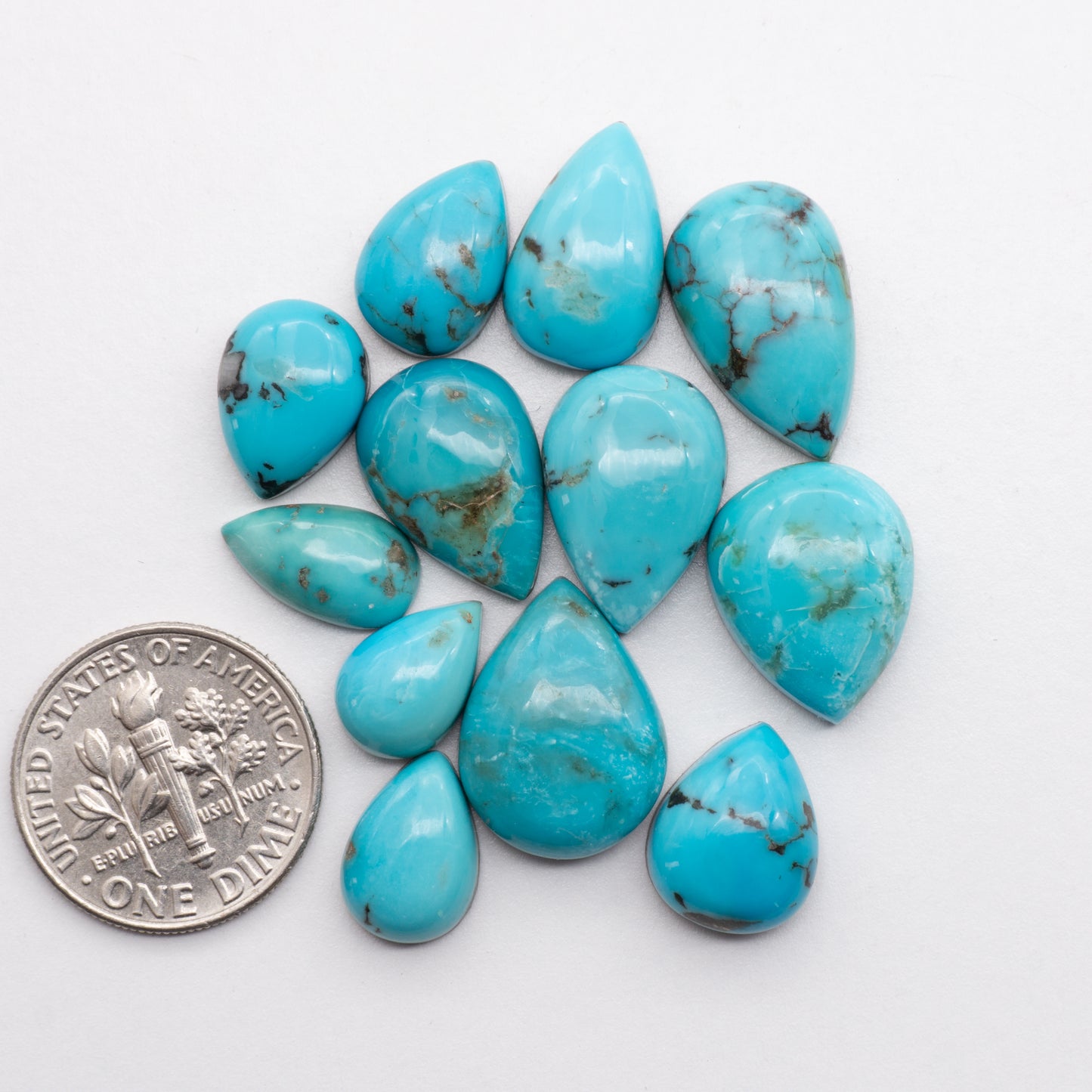 Add unique splashes of color to your jewelry with our Kingman Turquoise. Featuring natural blue hues, these cabochons offer a beautiful contrast to any design. These cabochons are backed for added strength, perfect for necklaces, earrings, and more!