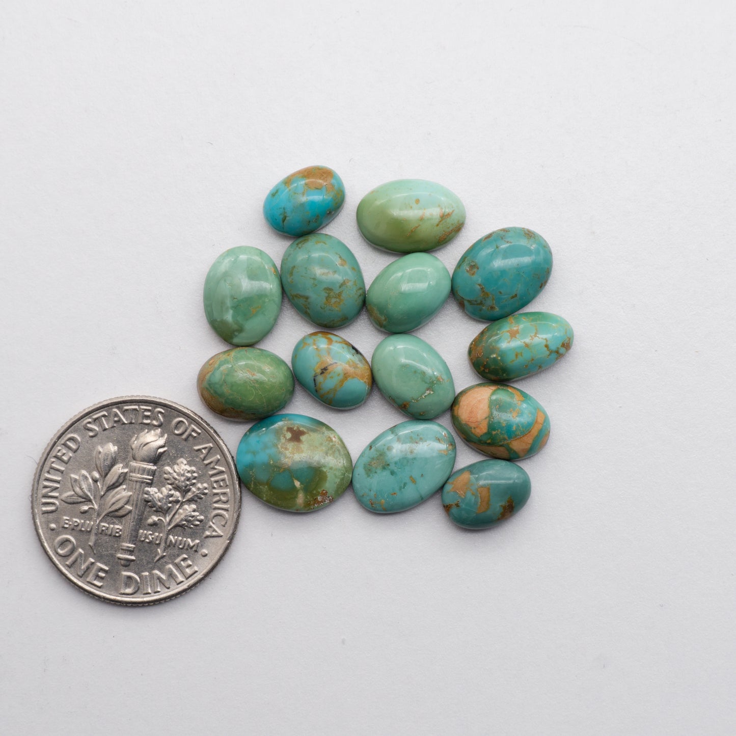 These beautiful blue green turquoise cabochons have a glossy finish and are backed for added strength. Mined in Colorado, USA. Similar to Royston turquoise used for jewelry making.