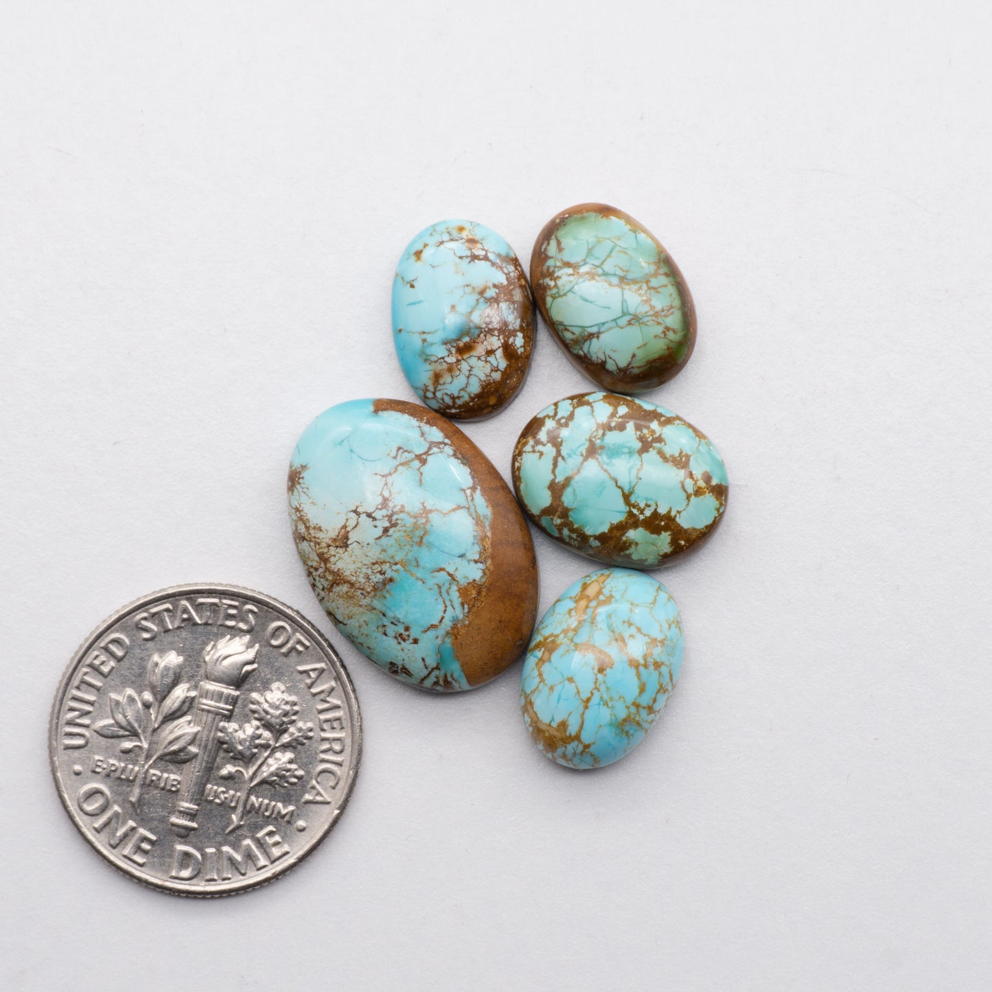 These beautiful blue green turquoise cabochons have a glossy finish and are backed for added strength. Mined in Colorado, USA. Similar to Royston turquoise used for jewelry making.