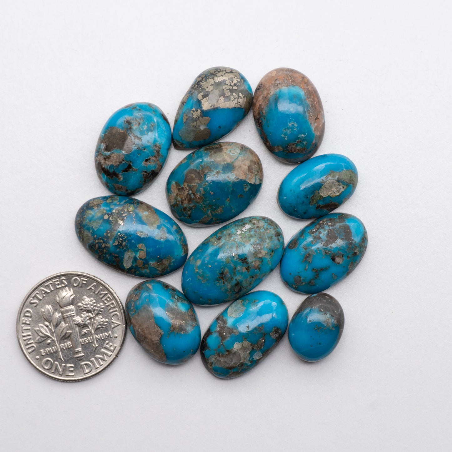 Add unique splashes of color to your jewelry with our Kingman Turquoise Cabochons. Featuring natural blue hues, these cabochons are backed for added strength and offer a beautiful contrast to any design. Perfect for necklaces, earrings, and more!