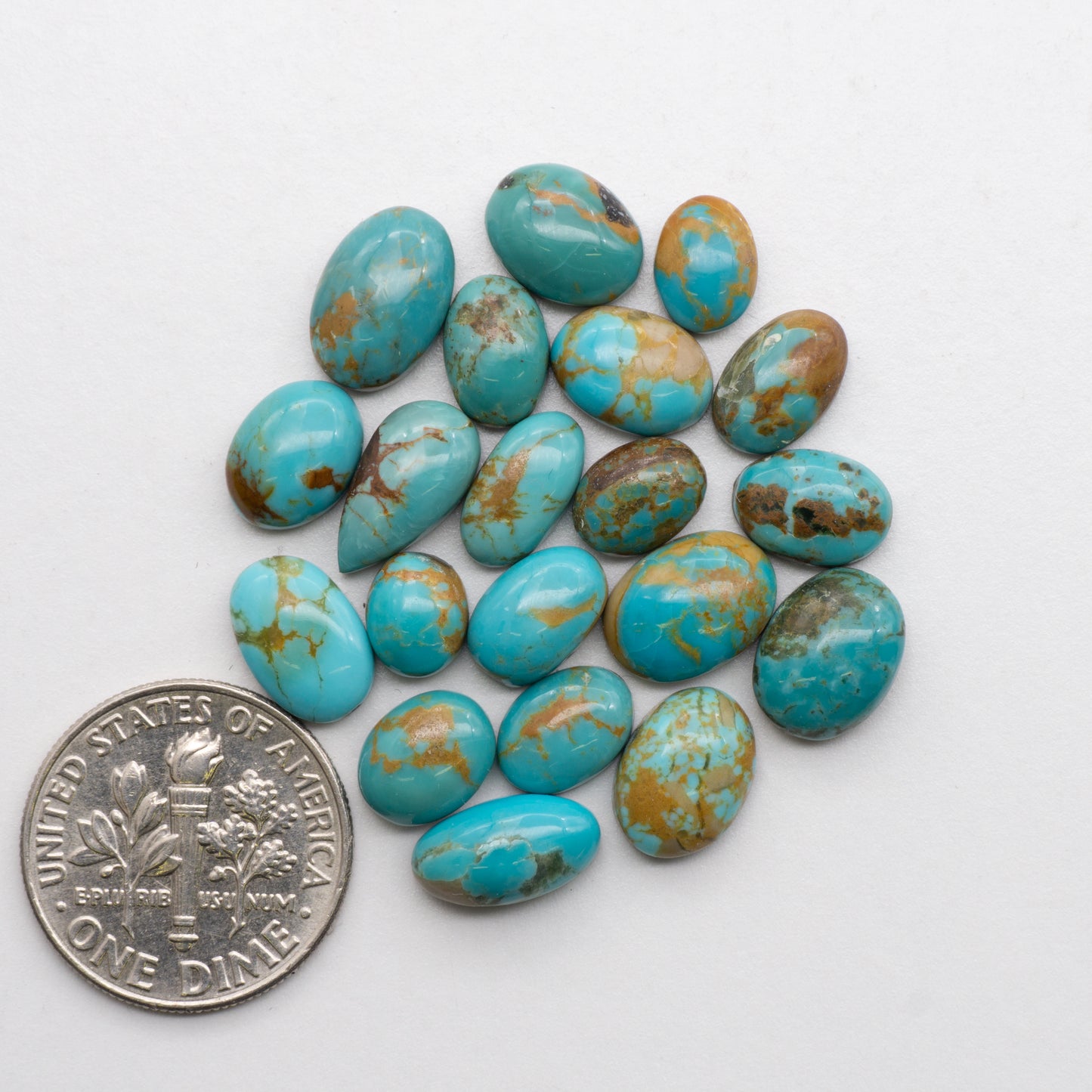 These beautiful blue green turquoise cabochons have a glossy finish and are backed for added strength. Mined in Colorado, USA. Similar to Royston turquoise used for jewelry making.