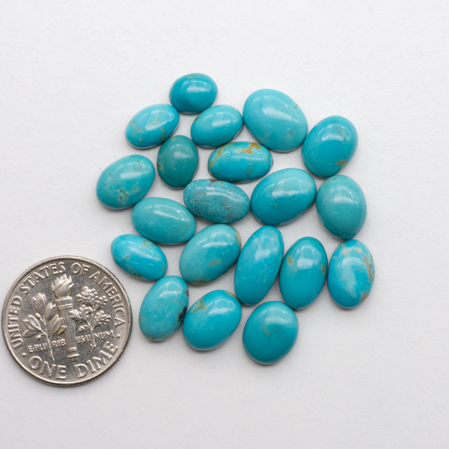 These beautiful blue green turquoise cabochons have a glossy finish and are backed for added strength. Mined in Colorado, USA. Similar to Royston turquoise used for jewelry making.