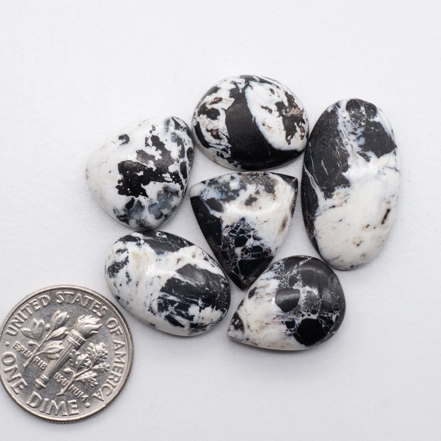 White Buffalo Cabochons have a glossy finish and are backed for added strength. White Buffaloe is mined in Nevada, USA White Buffalo is similar to turquoise and is used for jewelry making.