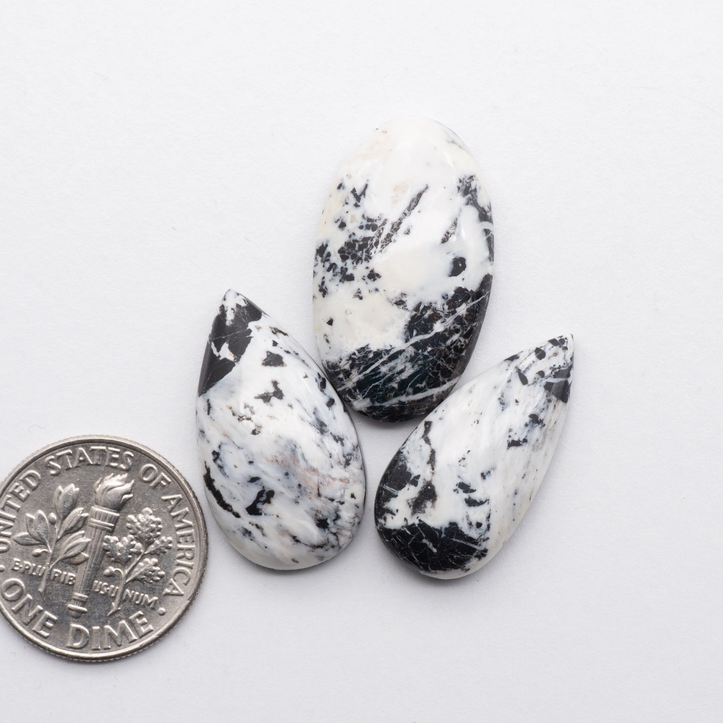 White Buffalo Cabochons have a glossy finish and are backed for added strength. White Buffaloe is mined in Nevada, USA White Buffalo is similar to turquoise and is used for jewelry making.