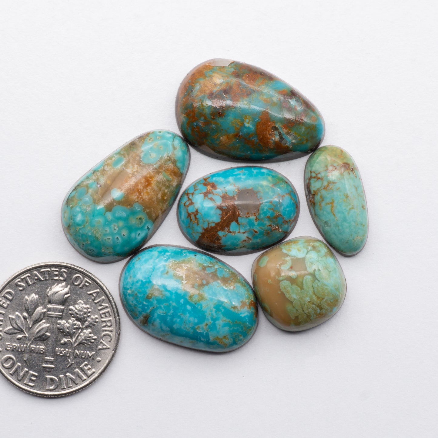 Cumpas Turquoise cabochons have a glossy finish and are backed for added strength. Cumpas Turquoise is mined in Sonora, Mexico.