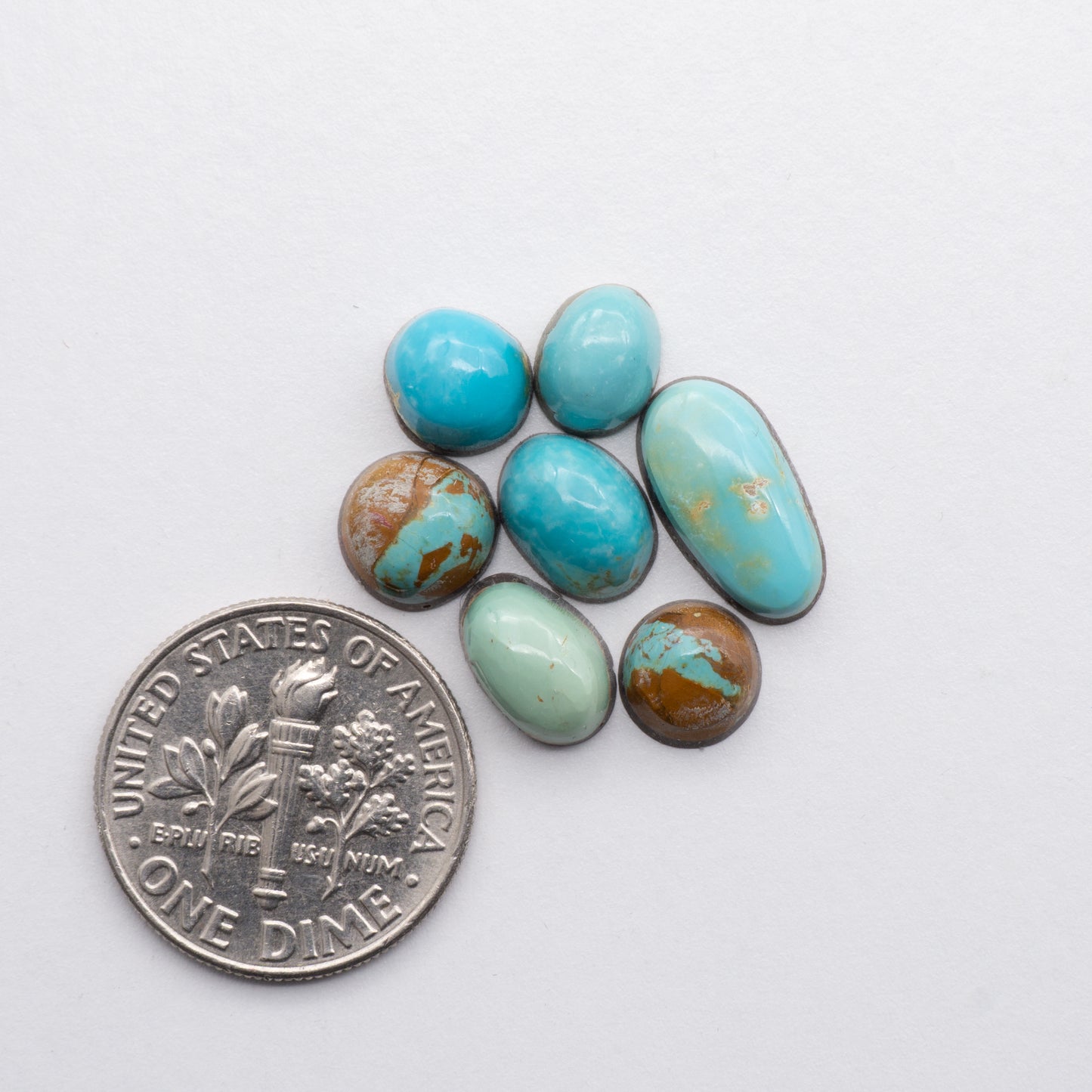 This Mixed Turquoise Lot features a unique mix of turquoise cabochons with a variety of shapes and sizes. Perfect for creating dazzling jewelry and other craft projects