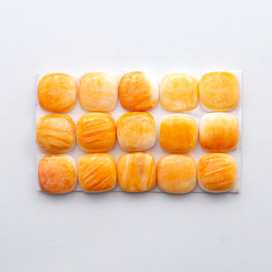 Add a unique, natural touch to your jewelry designs with our Orange Spiny Oyster Cabochons.