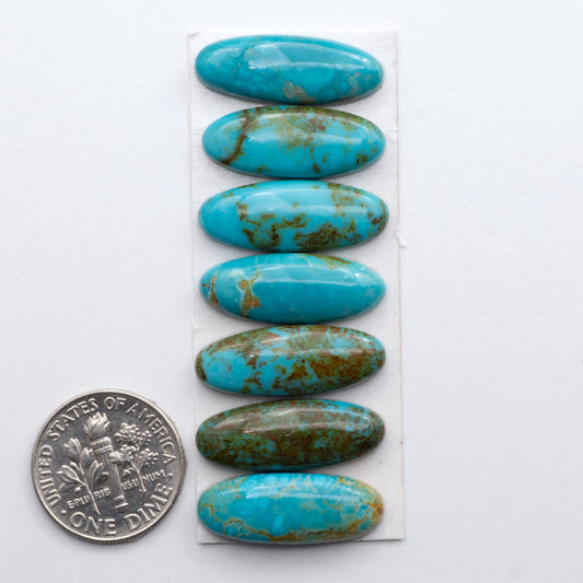 Add a touch of unique beauty to your collection with our stunning Pilot Mountain Turquoise cabochons