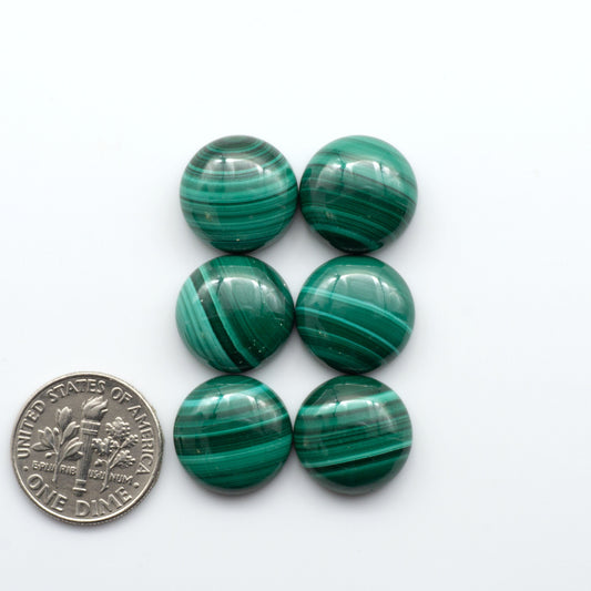 These Malachite Cabochons feature a rich green color and unique swirling patterns, making them a stunning addition to any jewelry or craft project.