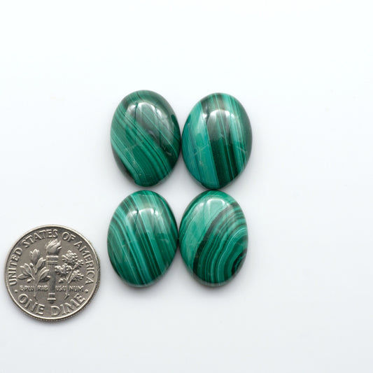 These Malachite Cabochons feature a rich green color and unique swirling patterns, making them a stunning addition to any jewelry or craft project.