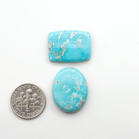 Experience the unique beauty of Fox Turquoise, mined in Nevada, USA. These natural cabochons are backed for added strength.