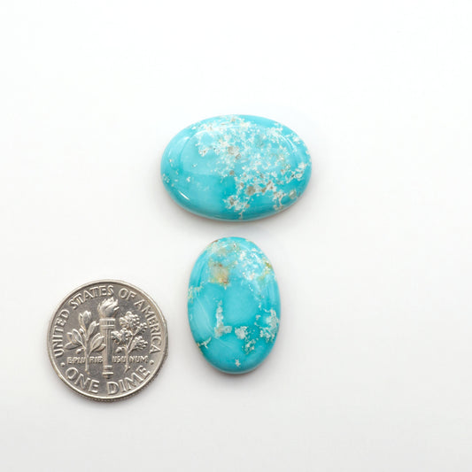 Experience the unique beauty of Fox Turquoise, mined in Nevada, USA. These natural cabochons are backed for added strength.