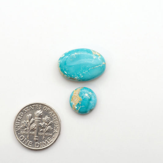 Experience the unique beauty of Fox Turquoise, mined in Nevada, USA. These natural cabochons are backed for added strength.