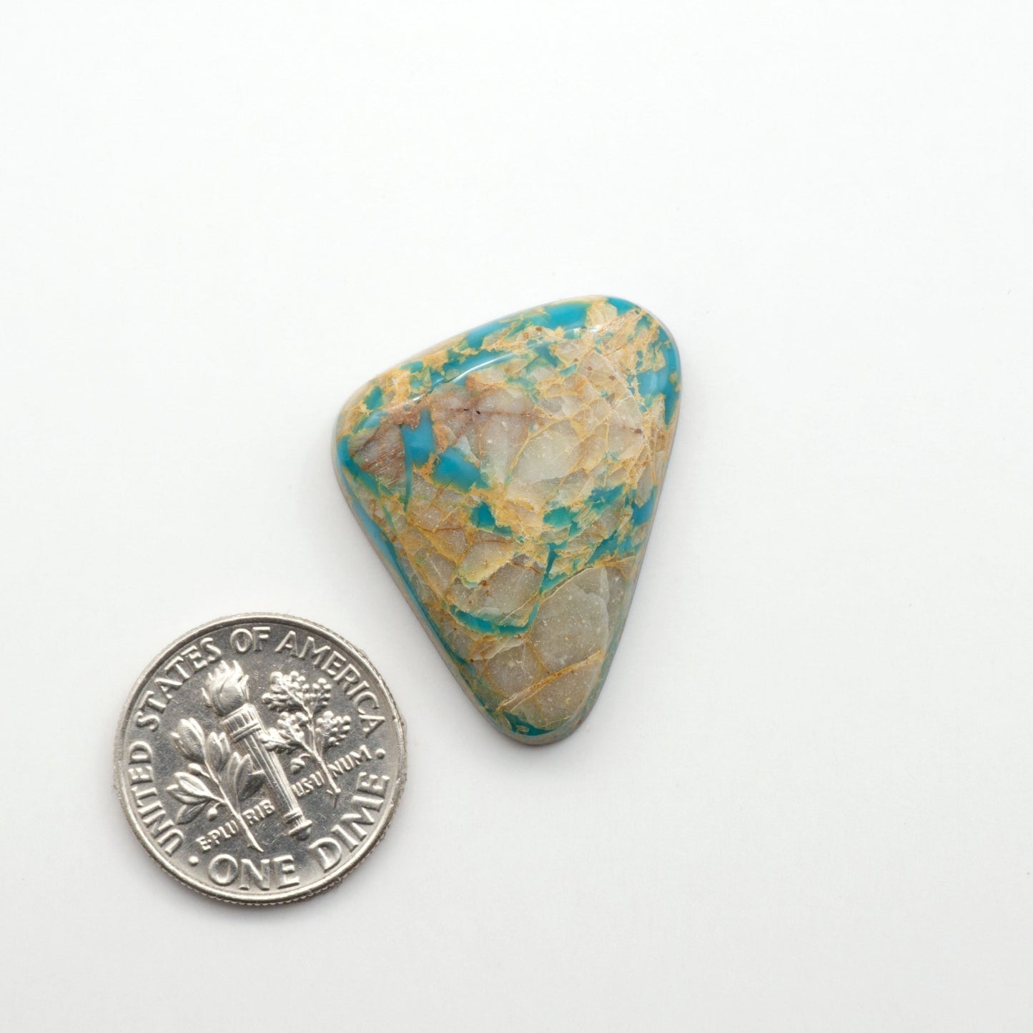 Royston Turquoise cabochons are famous for their distinctive matrix and unique green and blue hues, making them a favored option among jewelry designers.