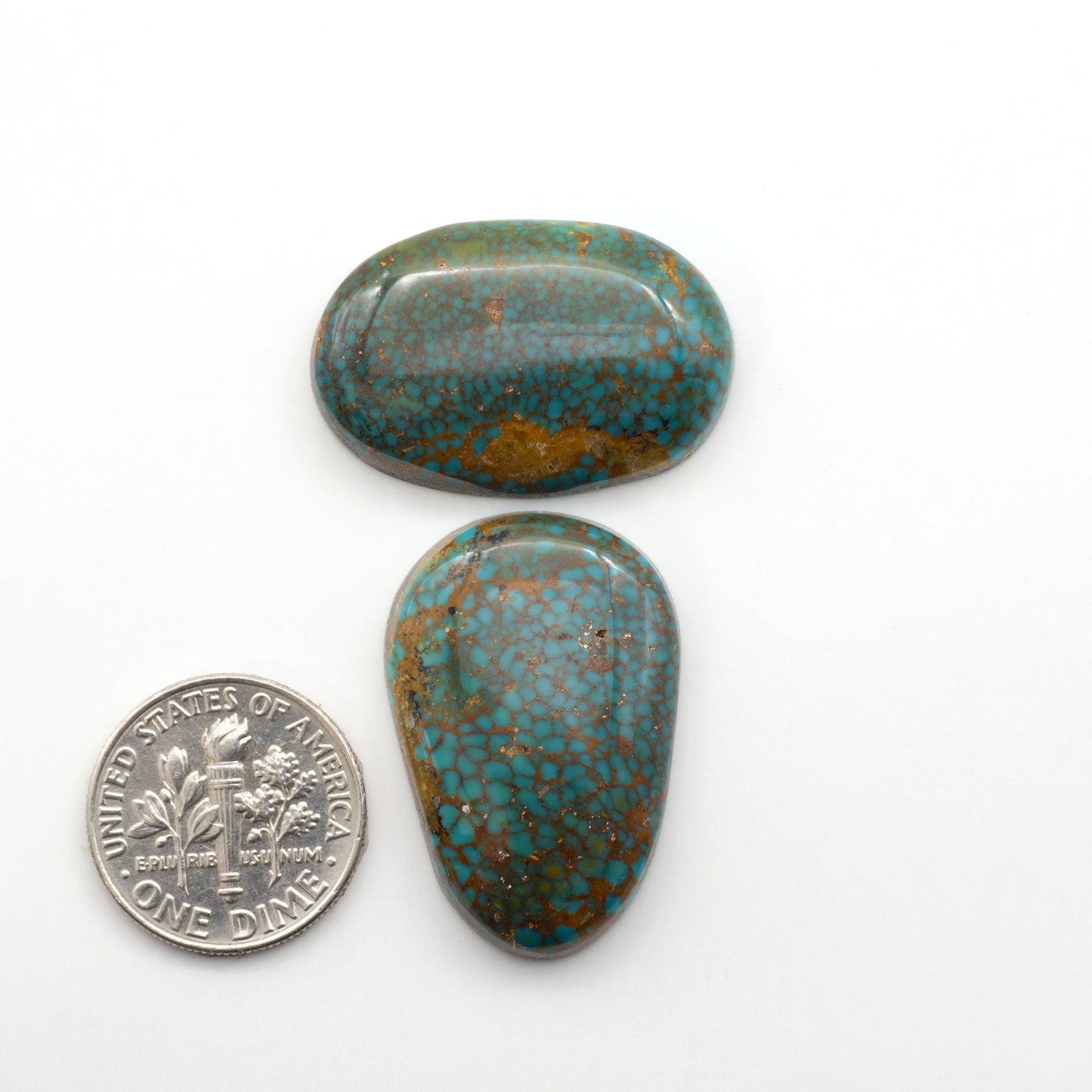 Kingman Turquoise Cabochons are a staple in the jewelry industry, known for their stunning blue-green color. Perfect for necklaces, earrings, and more!