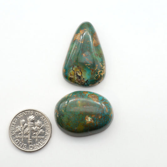 Kingman Turquoise Cabochons are a staple in the jewelry industry, known for their stunning blue-green color. Perfect for necklaces, earrings, and more!