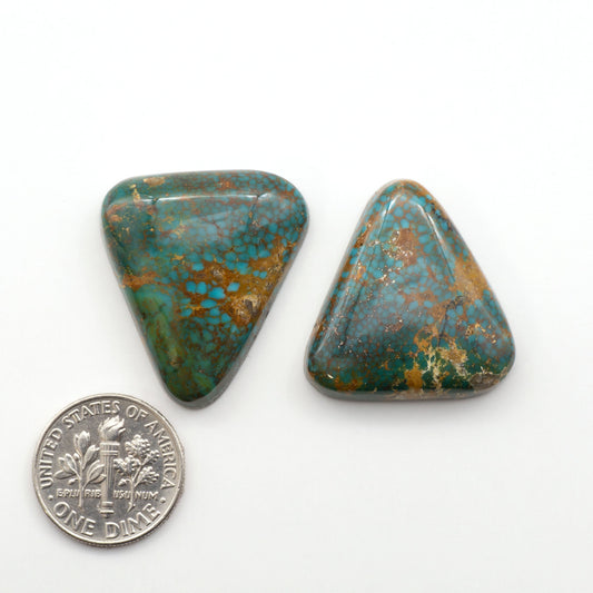 Kingman Turquoise Cabochons are a staple in the jewelry industry, known for their stunning blue-green color. Perfect for necklaces, earrings, and more!