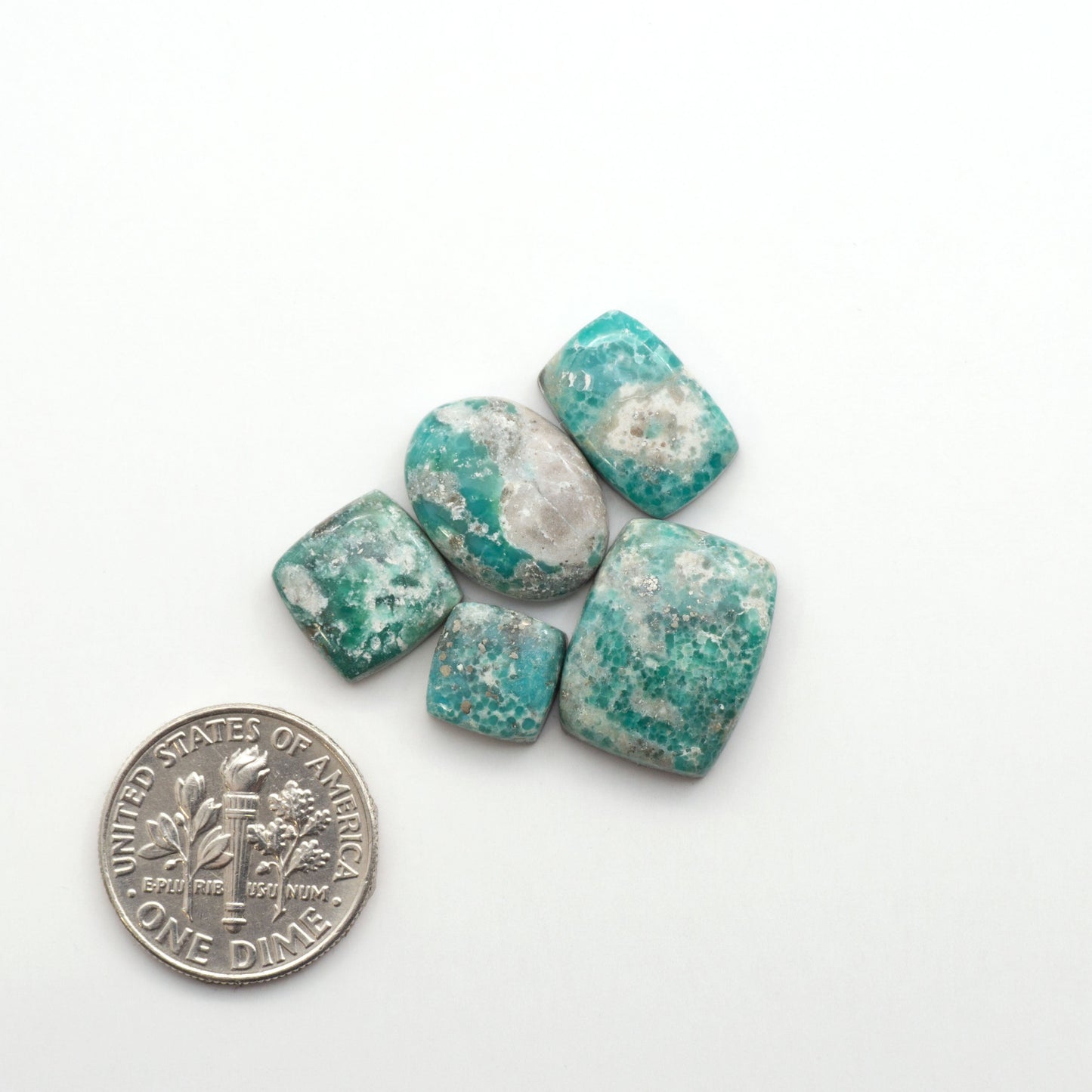White Water Turquoise Cabochons with their mesmerizing patterns and one-of-a-kind colors, are perfect for those looking for a unique and eye-catching piece.