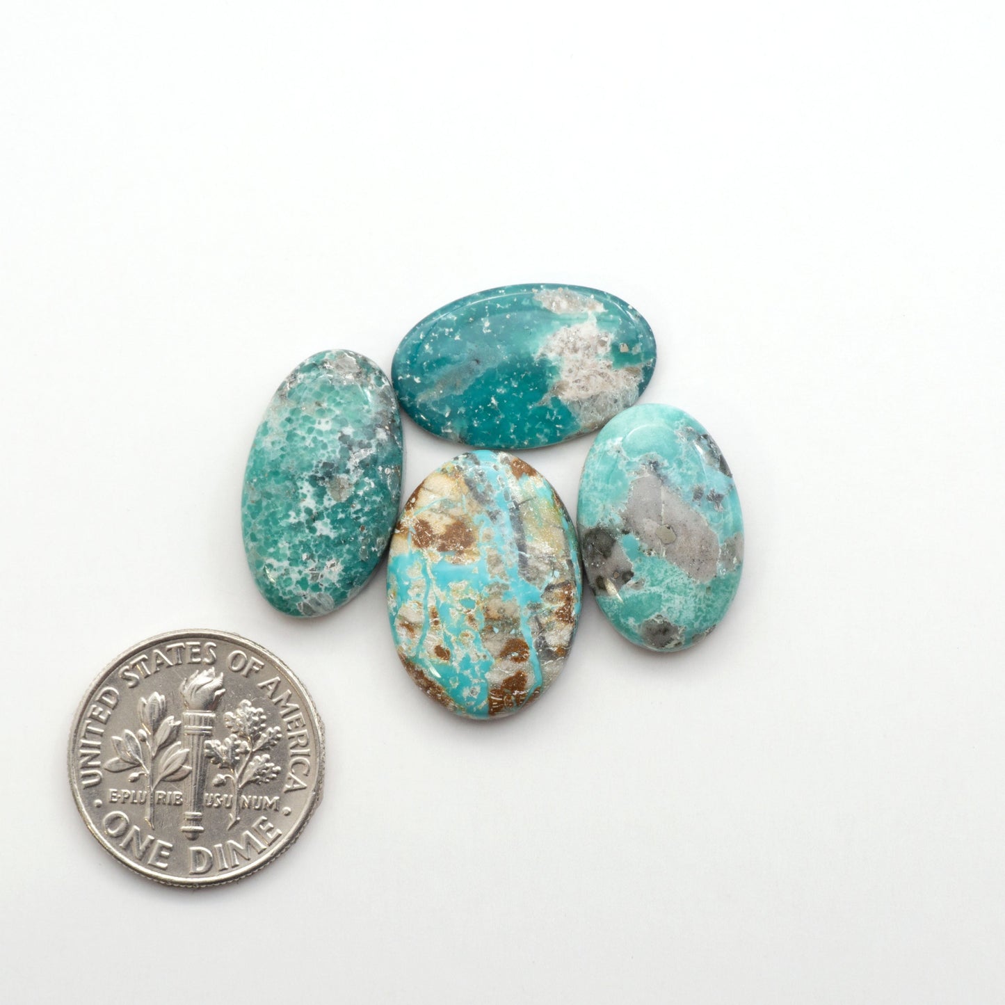 White Water Turquoise Cabochons with their mesmerizing patterns and one-of-a-kind colors, are perfect for those looking for a unique and eye-catching piece.