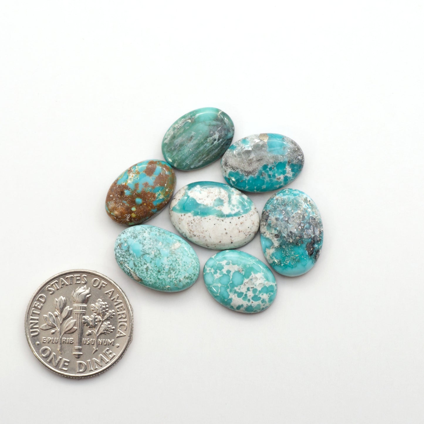 White Water Turquoise Cabochons with their mesmerizing patterns and one-of-a-kind colors, are perfect for those looking for a unique and eye-catching piece.