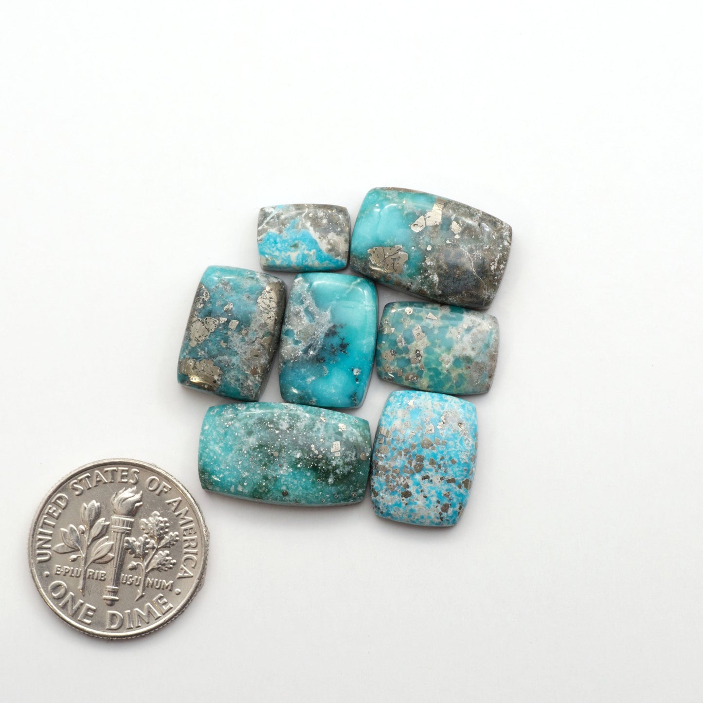 White Water Turquoise Cabochons with their mesmerizing patterns and one-of-a-kind colors, are perfect for those looking for a unique and eye-catching piece.