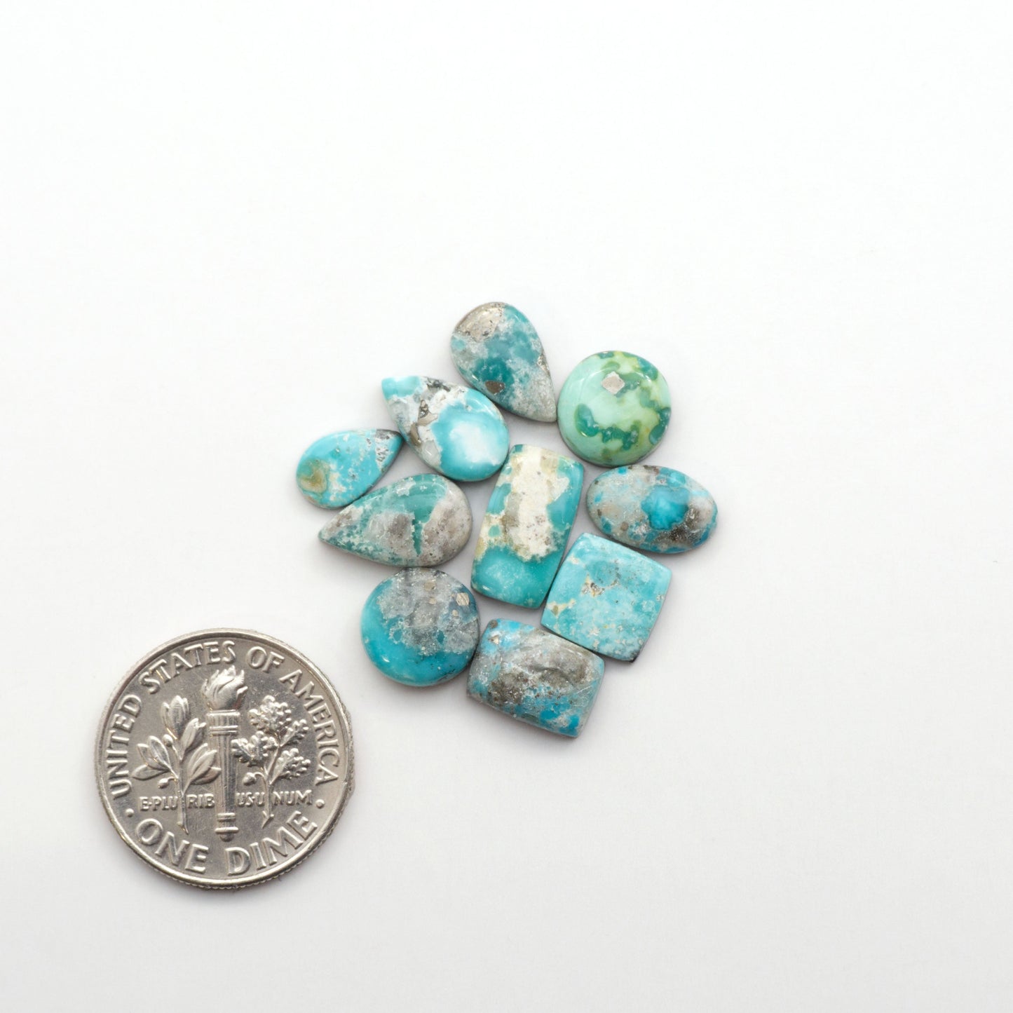 White Water Turquoise Cabochons with their mesmerizing patterns and one-of-a-kind colors, are perfect for those looking for a unique and eye-catching piece.