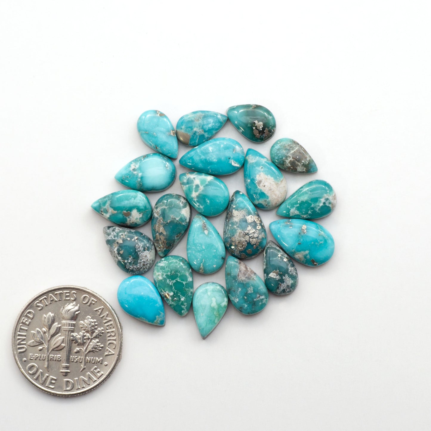 White Water Turquoise Cabochons with their mesmerizing patterns and one-of-a-kind colors, are perfect for those looking for a unique and eye-catching piece.