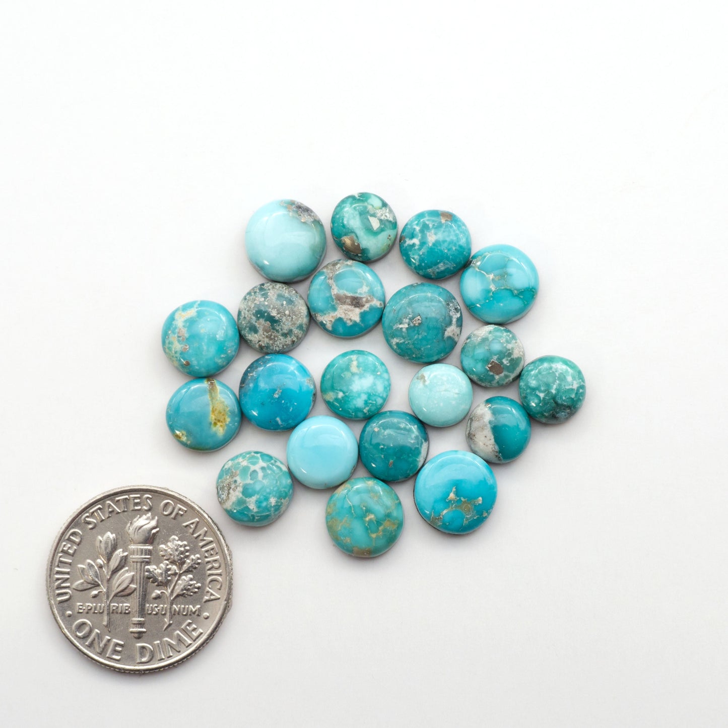 White Water Turquoise Cabochons with their mesmerizing patterns and one-of-a-kind colors, are perfect for those looking for a unique and eye-catching piece.