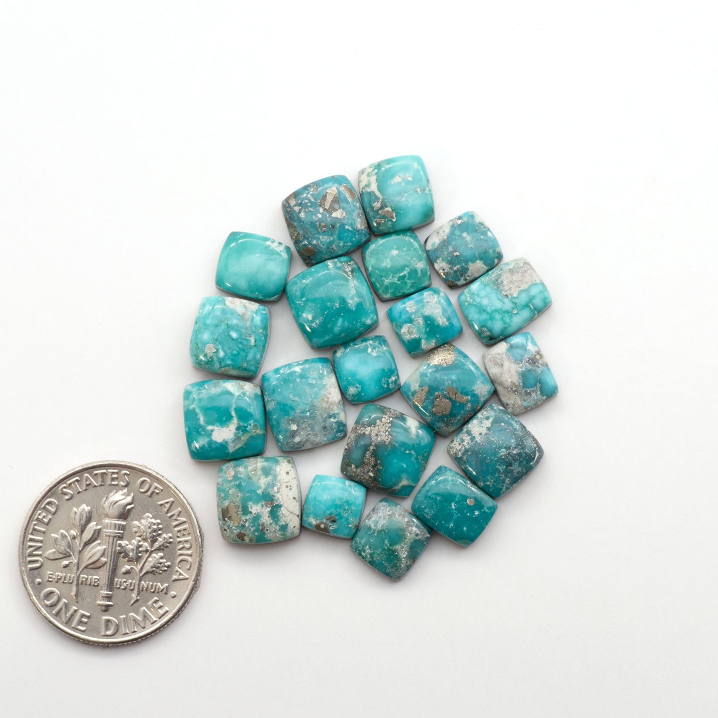 White Water Turquoise Cabochons with their mesmerizing patterns and one-of-a-kind colors, are perfect for those looking for a unique and eye-catching piece.