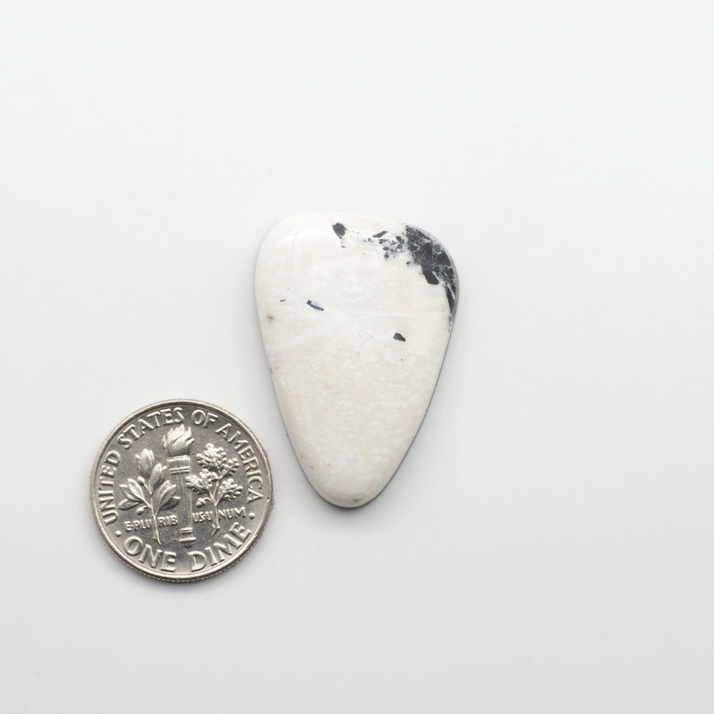 Natural White Buffalo Stone Cabochons are semi-precious gemstones cut into shapes ideal for jewelry-making, making them an excellent choice for artisans.